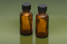 1 oz. amber bottle w/lid