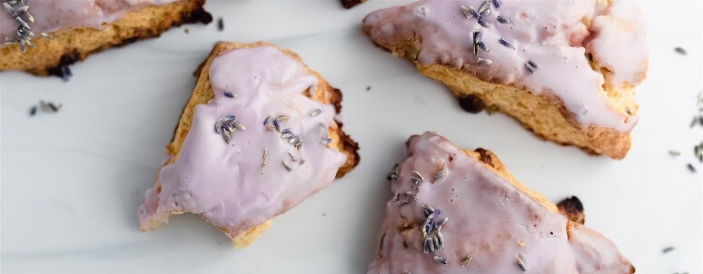 Lavender baked goods with floral glaze