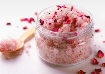 Dried rose petals can be added to natural skin scrubs for gentle exfoliation and extra scent.